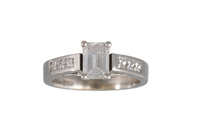 Lot 120 - A DIAMOND SOLITAIRE RING, the emerald cut...