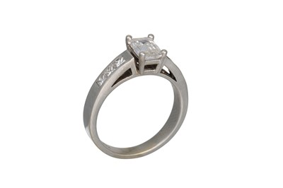Lot 120 - A DIAMOND SOLITAIRE RING, the emerald cut...