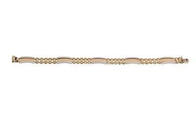 Lot 135 - A GENT'S TWO TONE BRACELET, in 14ct gold,...