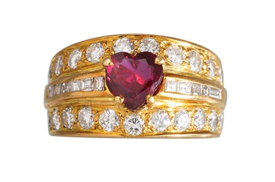 Lot 315 - A RUBY AND DIAMOND RING, the heart shaped ruby...