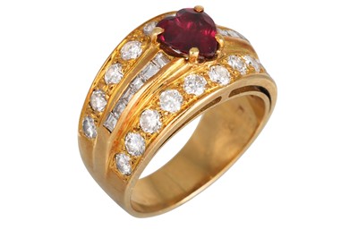 Lot 315 - A RUBY AND DIAMOND RING, the heart shaped ruby...