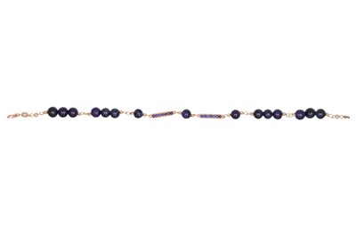 Lot 321 - A SAPPHIRE BRACELET, the circular beads linked...