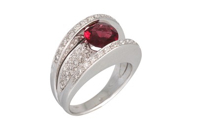 Lot 333 - A RHODOLITE AND DIAMOND RING, the circular...