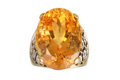 Lot 334 - A CITRINE RING, the oval citrine to rose cut...
