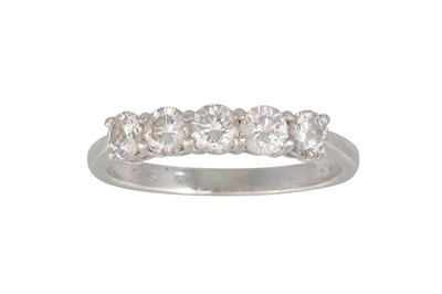 Lot 307 - A FIVE STONE DIAMOND RING, mounted in platinum....