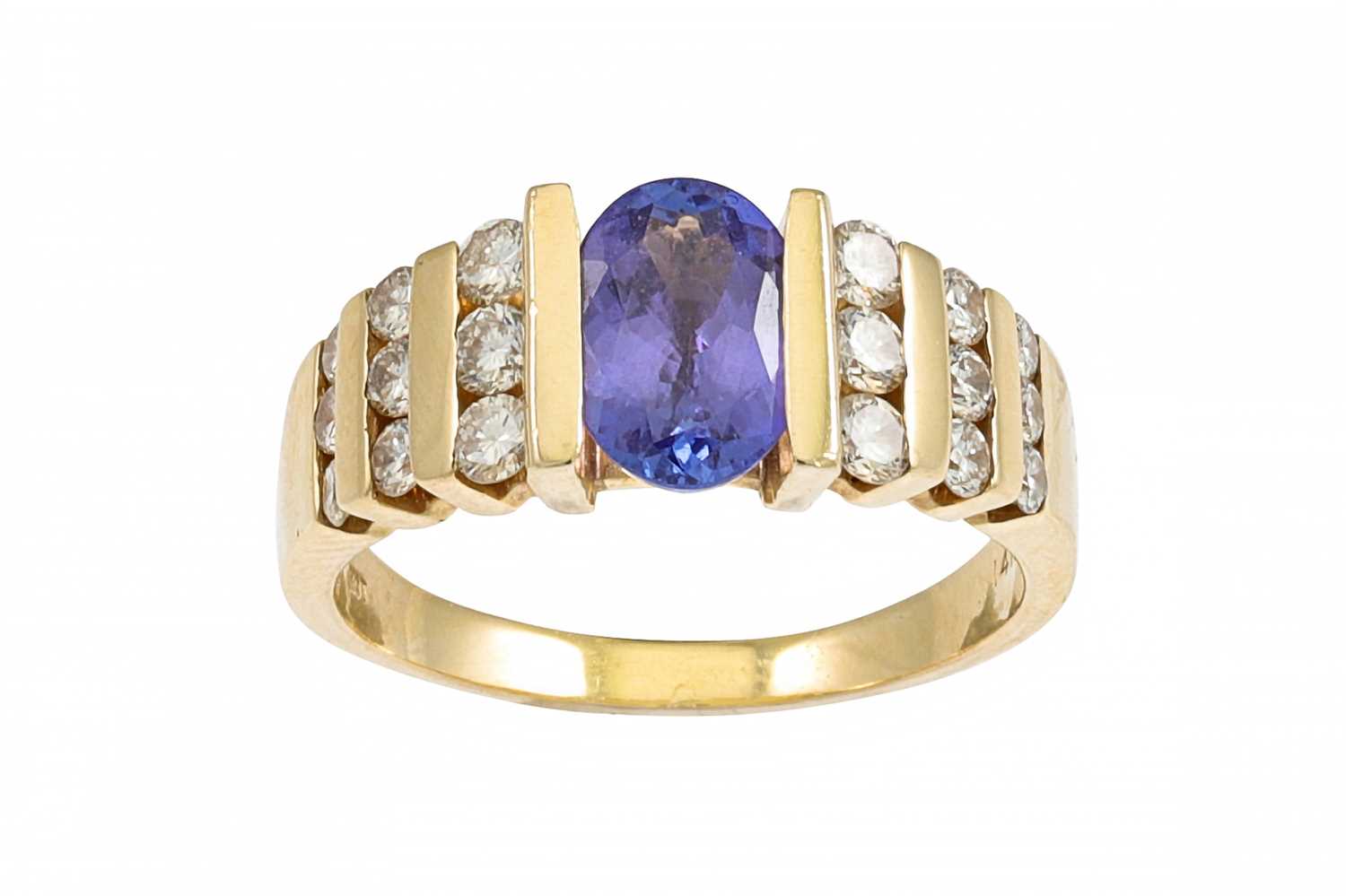 Lot 167 - A TANZANITE AND DIAMOND RING, the oval...
