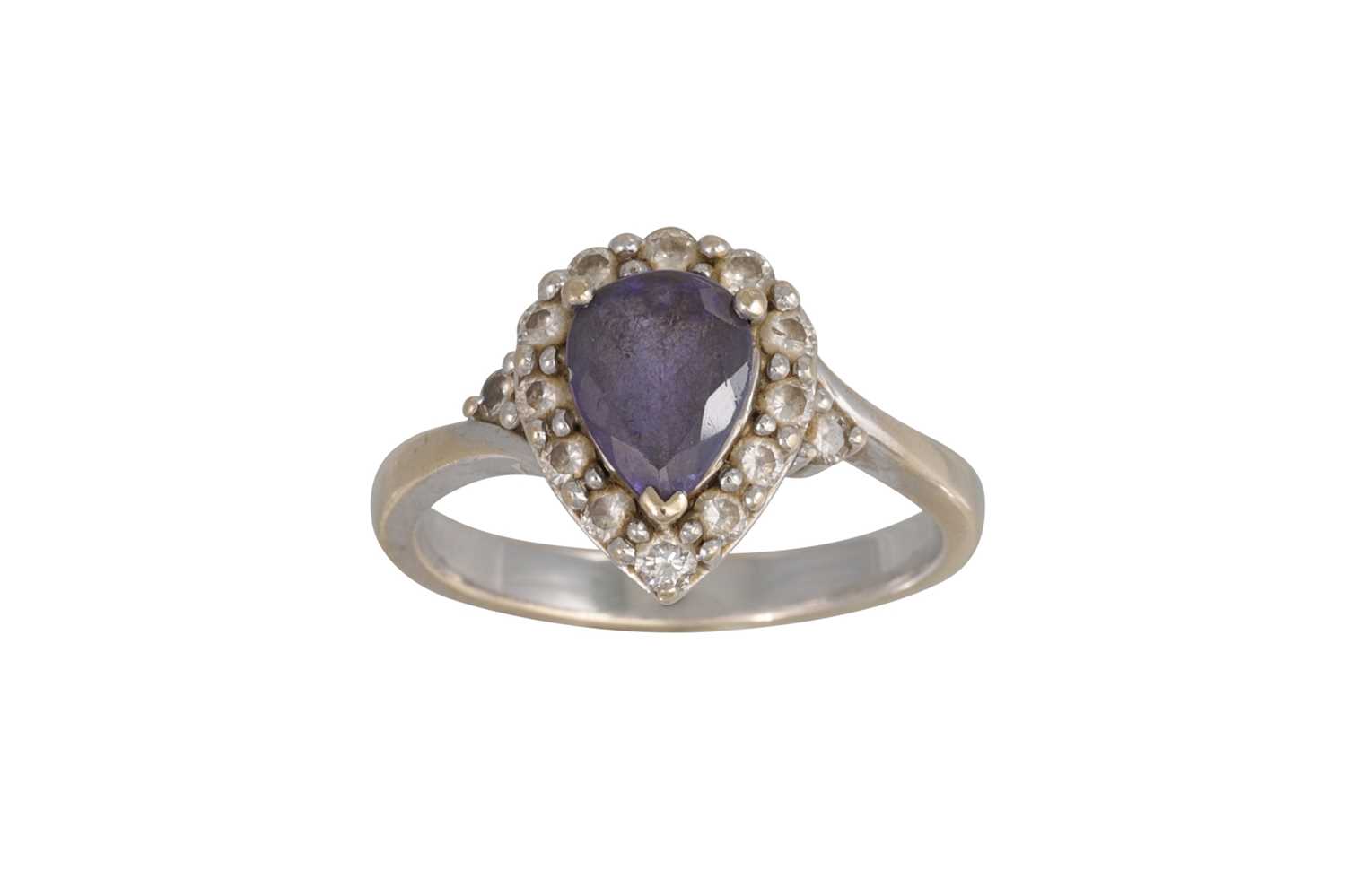Lot 136 - A TANZANITE AND DIAMOND CLUSTER RING, the pear...