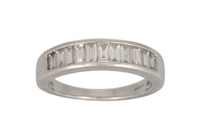 Lot 342 - A DIAMOND HALF ETERNITY RING, channel set with...