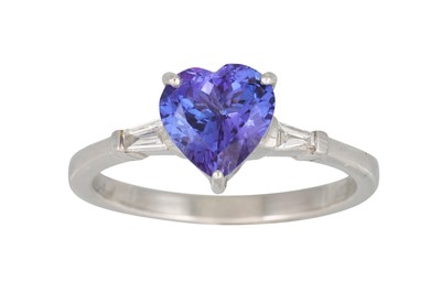 Lot 355 - A TANZANITE RING, heart shaped stone to a...