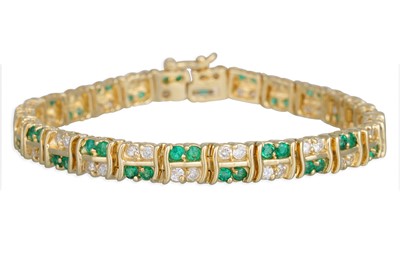 Lot 423 - AN EMERALD AND DIAMOND BRACELET, set with...
