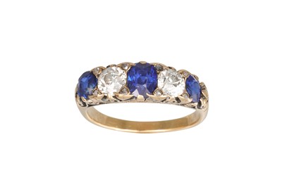 Lot 392 - A SAPPHIRE AND DIAMOND FIVE STONE RING, the...