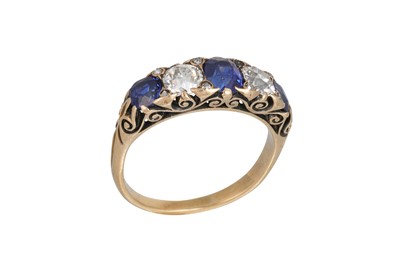 Lot 392 - A SAPPHIRE AND DIAMOND FIVE STONE RING, the...