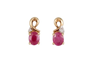 Lot 1 - A PAIR OF RUBY AND DIAMOND EARRINGS, mounted...