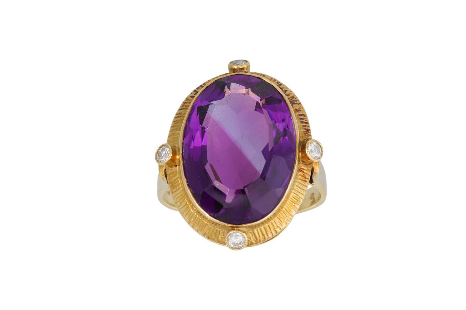 Lot 2 - AN AMETHYST AND DIAMOND RING, to a diamond...