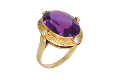 Lot 2 - AN AMETHYST AND DIAMOND RING, to a diamond...