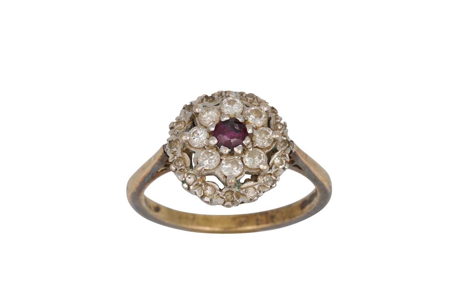 Lot 58 - A RUBY AND DIAMOND CLUSTER DRESS RING, mounted...