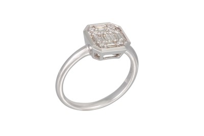 Lot 156 - A DIAMOND CLUSTER RING, the baguette and...