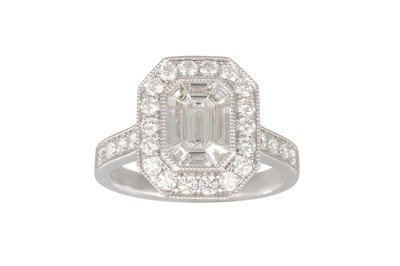 Lot 157 - A DIAMOND CLUSTER RING, the baguette and...