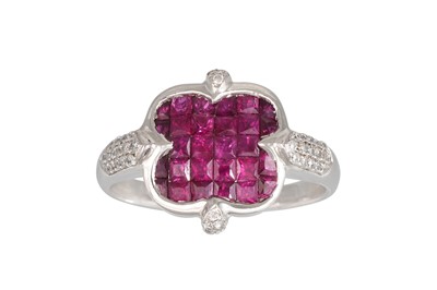 Lot 160 - A RUBY AND DIAMOND CLUSTER RING, the princess...