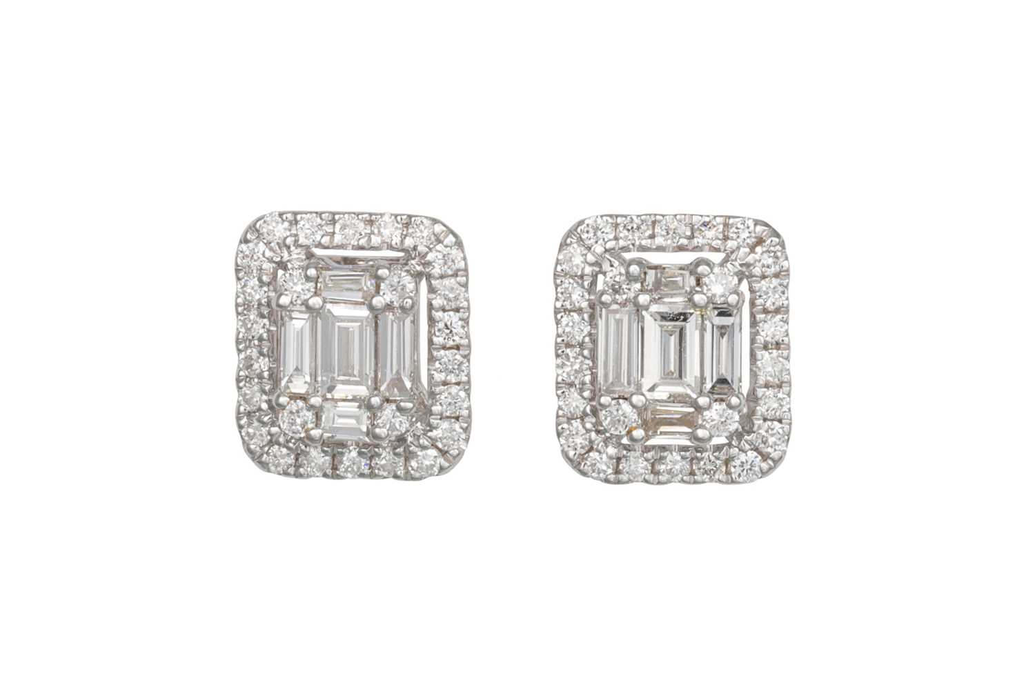 Lot 191 - A PAIR OF DIAMOND CLUSTER EARRINGS, set with...