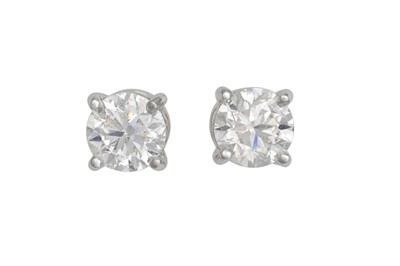 Lot 193 - A PAIR OF DIAMOND STUD EARRINGS, the round...