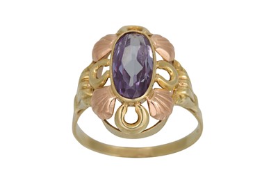 Lot 235 - A VINTAGE SAPPHIRE RING, the oval stone to a...
