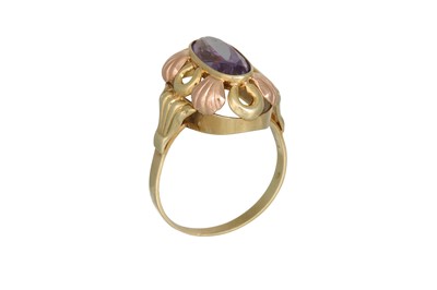 Lot 235 - A VINTAGE SAPPHIRE RING, the oval stone to a...