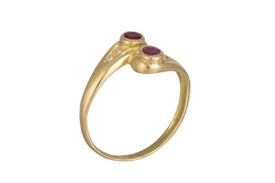 Lot 252 - A RUBY AND DIAMOND RING, of twist design...