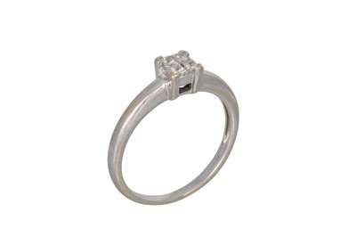 Lot 265 - A DIAMOND CLUSTER RING, set with four...