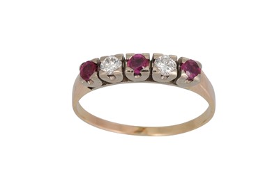 Lot 325 - A RUBY AND DIAMOND FIVE STONE RING, the...