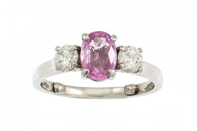 Lot 4 - A DIAMOND AND PINK SAPPHIRE DRESS RING, the...