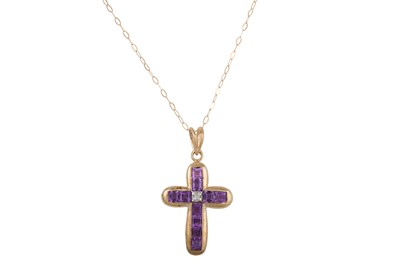 Lot 40 - AN AMETHYST AND DIAMOND CROSS, the centre...