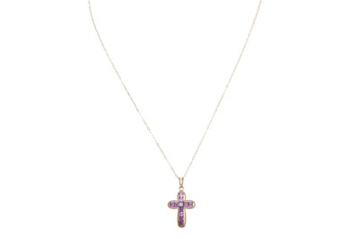 Lot 40 - AN AMETHYST AND DIAMOND CROSS, the centre...