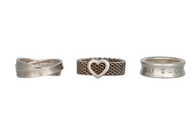 Lot 42 - THREE SILVER TIFFANY & CO RINGS, stamped T &...