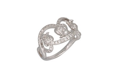 Lot 91 - A DIAMOND SET OPEN WORK RING, mounted in 9ct...