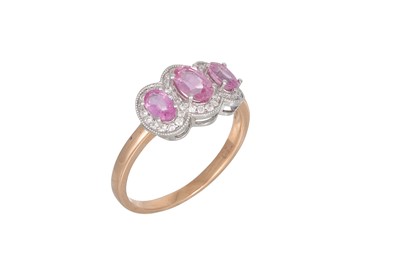 Lot 94 - A PINK SAPPHIRE AND DIAMOND TRIPLE CLUSTER...