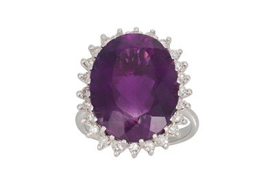 Lot 109 - AN AMETHYST AND DIAMOND CLUSTER RING, the...