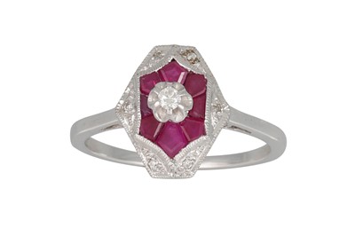 Lot 113 - A DIAMOND AND RUBY CLUSTER RING, the hexagonal...