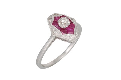 Lot 113 - A DIAMOND AND RUBY CLUSTER RING, the hexagonal...