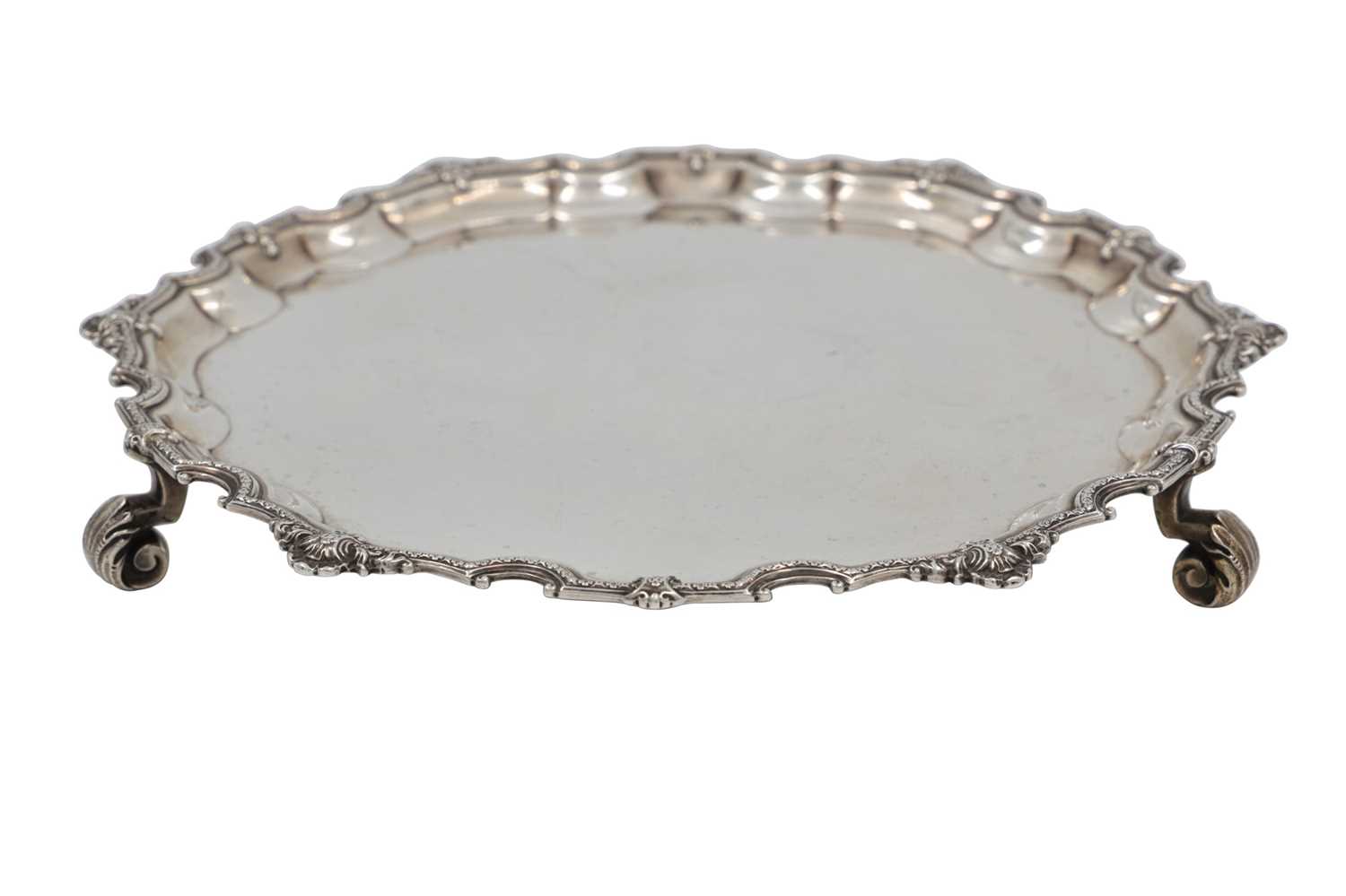 Lot 606 - A HEAVY CIRCULAR PRE-WAR SILVER SALVER, with...