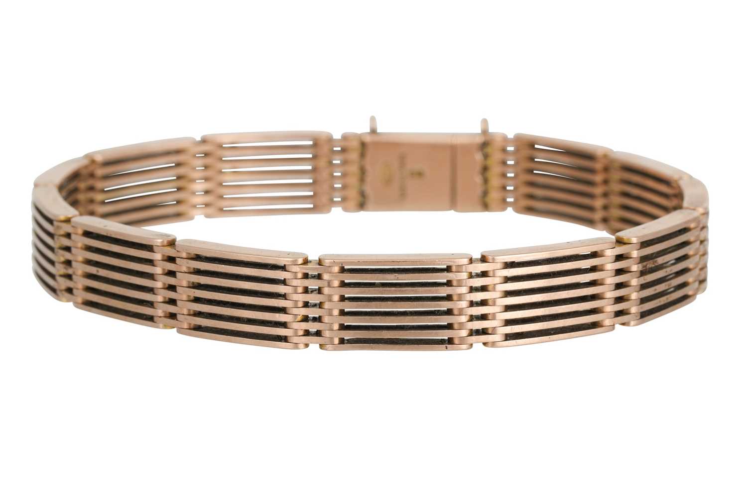 Lot 180 - AN ANTIQUE 9CT ROSE GOLD GATE BRACELET, with...