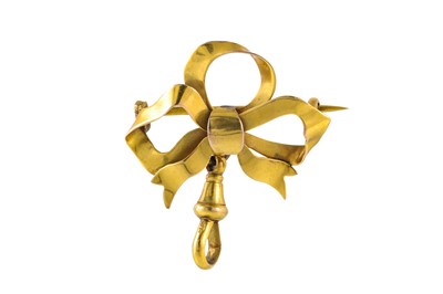 Lot 299 - A 9CT GOLD VINTAGE BROOCH, modelled as a bow,...
