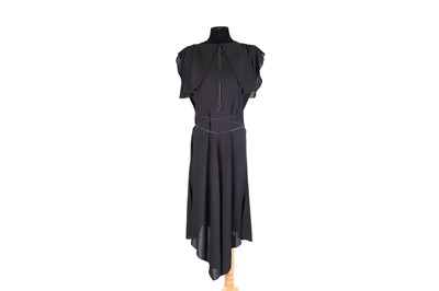 Lot 483 - A LADY'S ALAIA PARIS BLACK EVENING DRESS, the...