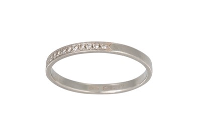 Lot 302 - A HALF ETERNITY DIAMOND RING, mounted in...