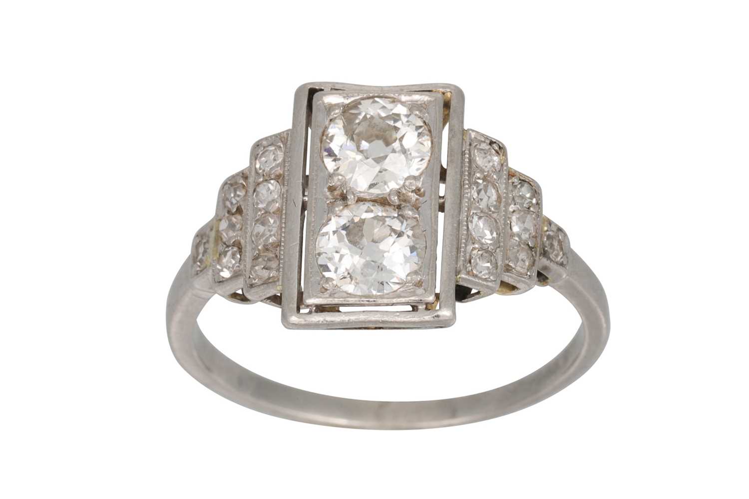 Lot 329 - AN ART DECO TWO STONE DIAMOND RING, stepped...