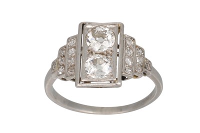 Lot 441 - AN ART DECO TWO STONE DIAMOND RING, stepped...