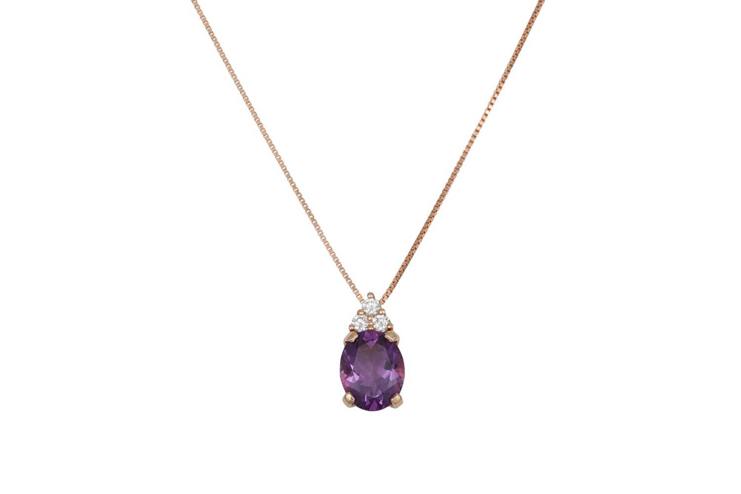 Lot 368 - AN AMETHYST AND DIAMOND PENDANT, the oval...