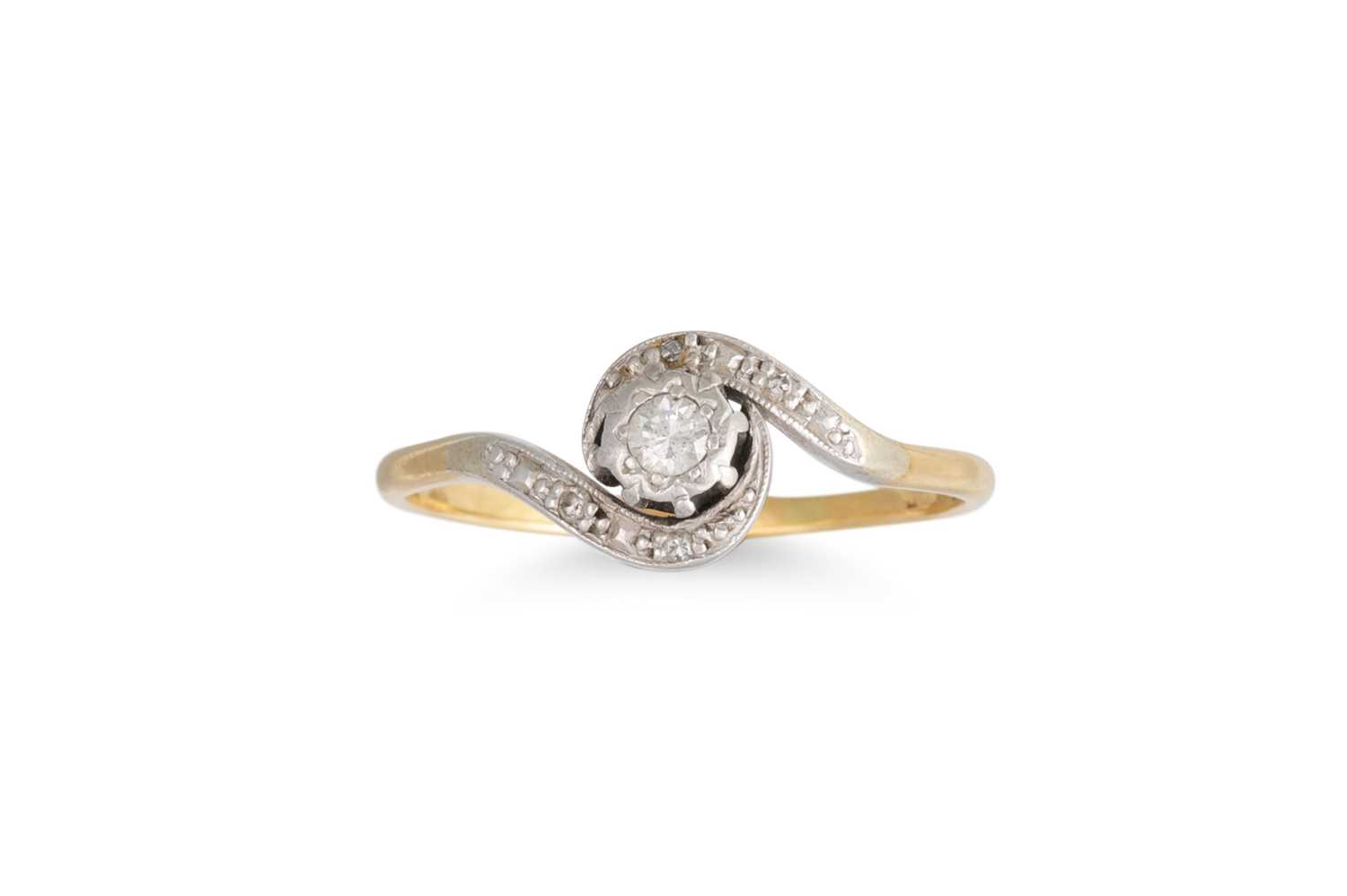 Lot 63 - A VINTAGE DIAMOND TWIST RING, mounted in 18ct...