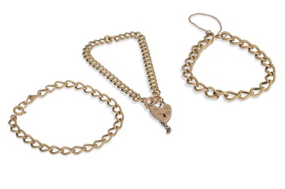 Lot 346 - THREE 9CT GOLD CURB LINK BRACELETS, one with...