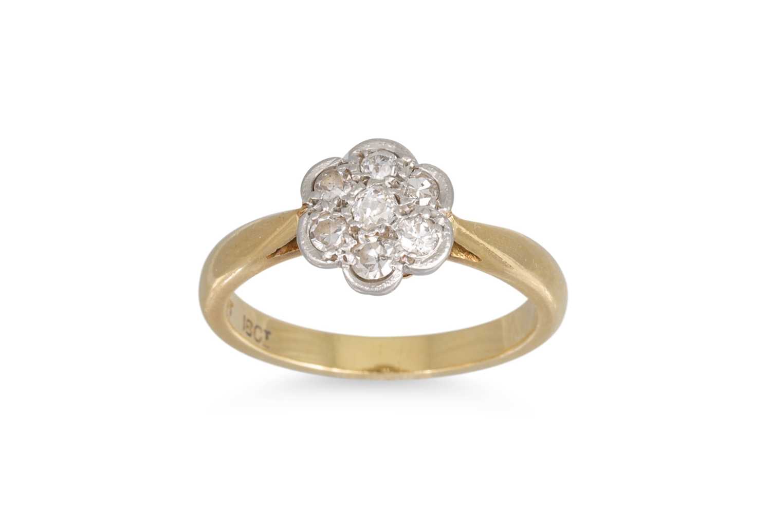 Lot 57 - A VINTAGE DIAMOND 'DAISY' CLUSTER RING, the...